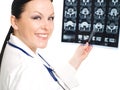 Female doctor examining x-ray picture Royalty Free Stock Photo