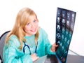 Female doctor examining x-ray picture Royalty Free Stock Photo