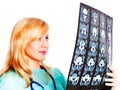 Female doctor examining x-ray picture over white Royalty Free Stock Photo