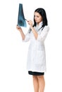 Female doctor examining an x-ray picture Royalty Free Stock Photo