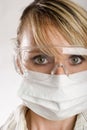 Female doctor with face mask Royalty Free Stock Photo