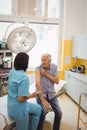 Female doctor giving an injection to a patient Royalty Free Stock Photo