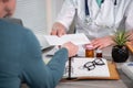 Female doctor giving prescription to her patient Royalty Free Stock Photo