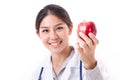 Female doctor with hand holding red apple Royalty Free Stock Photo