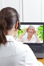 Doctor video call patient headache Royalty Free Stock Photo