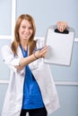 Female doctor holding blank chart Royalty Free Stock Photo