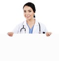 Female doctor holding blank sign Royalty Free Stock Photo