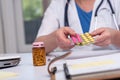 Female doctor holding a blister pack of pills Royalty Free Stock Photo