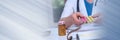 Female doctor holding a blister pack of pills. panoramic banner Royalty Free Stock Photo