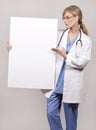 Female doctor holding board Royalty Free Stock Photo