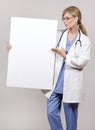 Female doctor holding board Royalty Free Stock Photo