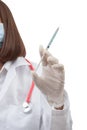 Female Doctor holding medical injection syringe and stethoscope Royalty Free Stock Photo