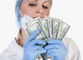 Female doctor holding money