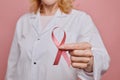 Female Doctor Holding Pink Ribbon Close Up Royalty Free Stock Photo