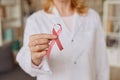 Female Doctor Holding Pink Ribbon Royalty Free Stock Photo