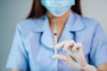 Doctor holding syringe with Coronavirus Covid-19 vaccine for injection test