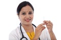 Female doctor holding syringe in hand Royalty Free Stock Photo