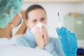 Female doctor holding syringe ready to make injection Royalty Free Stock Photo