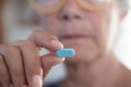 Female doctor holding the tablet for the fight against covid-19 coronavirus. Reduce the level of virus infection by avoiding