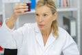 female doctor holding testing urine sample Royalty Free Stock Photo