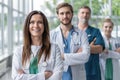 Female doctor at the hospital with her team. Royalty Free Stock Photo