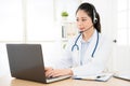 Female doctor through internet conversation Royalty Free Stock Photo