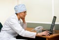 Female doctor with laptop Royalty Free Stock Photo