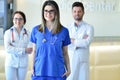 Female doctor leading a medical team at the hospital