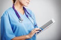 Female doctor looking at an x-ray of the patient Royalty Free Stock Photo