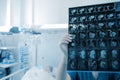 Female doctor looks at the scan image of patient thoracic organs