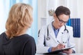 Female doctor making notes Royalty Free Stock Photo