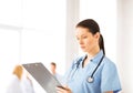 Female doctor or nurse in hospital Royalty Free Stock Photo