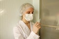 Female Doctor Or Nurse In Mask Holding Syringe Royalty Free Stock Photo