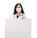 Female Doctor or Nurse Wearing Protective Face Mask Holding Blank Sign Isolated on White Background Royalty Free Stock Photo