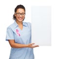 Female doctor or nurse with white blank board Royalty Free Stock Photo