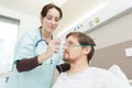 female doctor with patient with oxygen mask in hospital Royalty Free Stock Photo