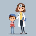 Female doctor pediatrician with patient child girl standing close to each other Royalty Free Stock Photo