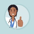 The female doctor peeks around the corner and show hand with thumb up Royalty Free Stock Photo