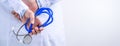 Female doctor portrait, young woman physican holding a stethoscope isolated on white background, close up, cropped view, copy