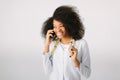 Female doctor Preparation medical equipment. An African American female medical doctor with a stethoscope in hospital on