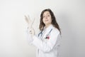 Female doctor putting latex gloves. Royalty Free Stock Photo