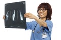 Female doctor reviewing x-ray report