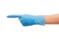 Female doctor's hand in blue surgical glove pointing on something Royalty Free Stock Photo