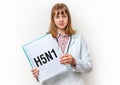Female doctor showing clipboard with written text: H5N1