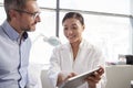 Female Doctor Showing Mature Male Patient Test Results On Digital Tablet In Office Royalty Free Stock Photo