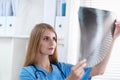 Female doctor showing x-ray at hospital Royalty Free Stock Photo