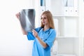 Female doctor showing x-ray at hospital Royalty Free Stock Photo