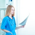 Female doctor showing x-ray at hospital Royalty Free Stock Photo