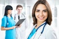 Female doctor standing in frount of his team Royalty Free Stock Photo