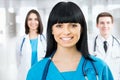 Female doctor standing in frount of his team Royalty Free Stock Photo